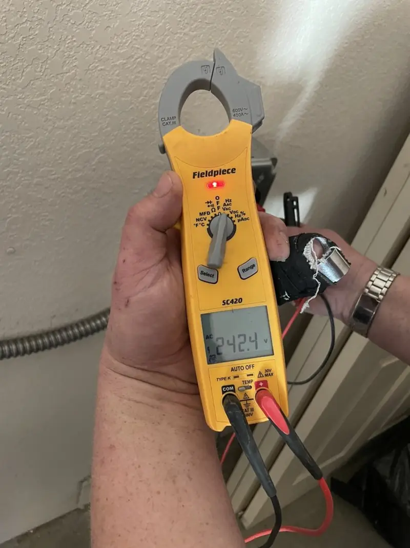 Voltage testing with clamp meter during Generator Installation in Fort Bragg